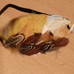 serre-tête à plumes
