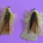 boucles d'oreilles à plumes jaunes 